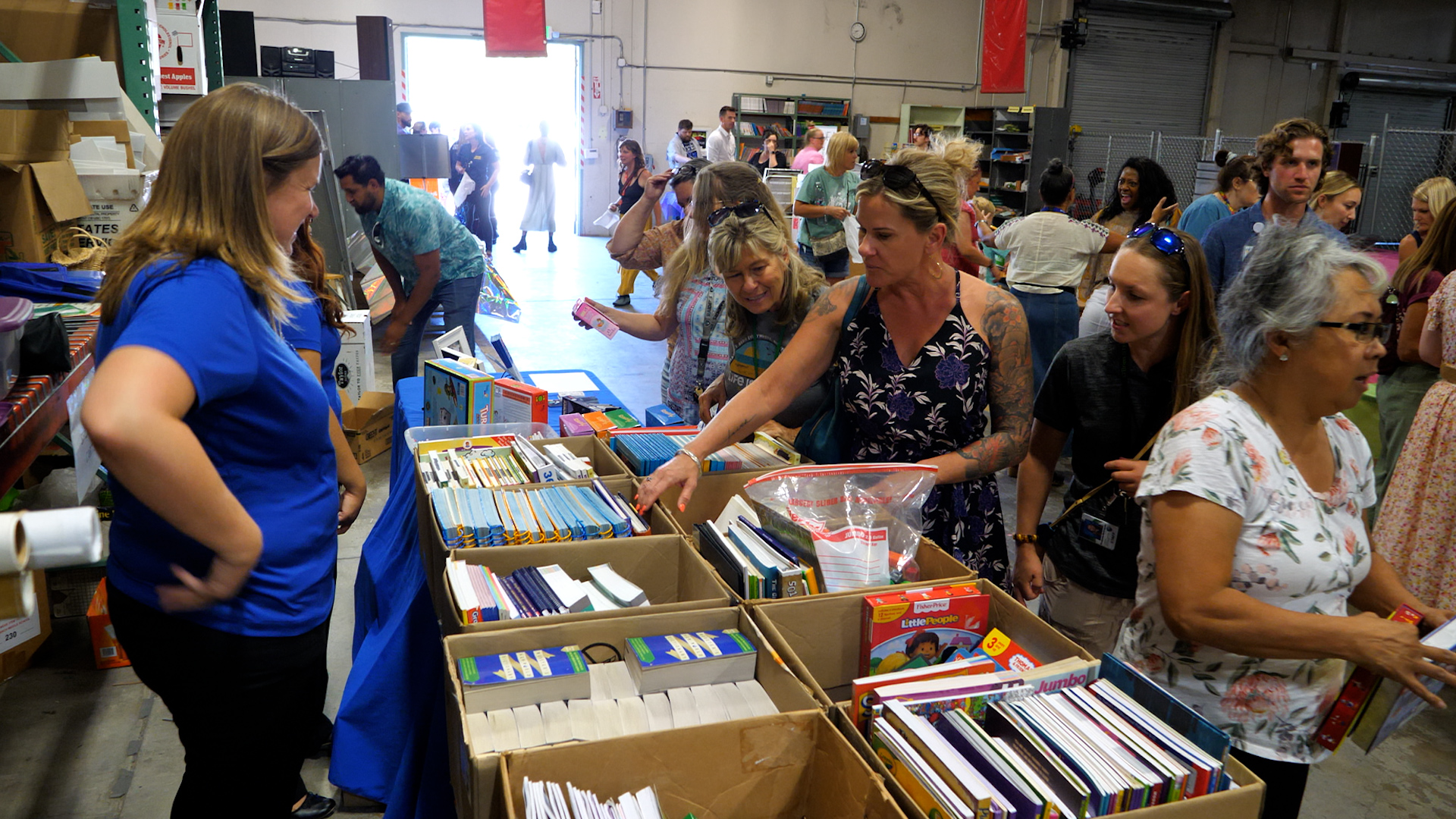  teachers gathering classroom supplies